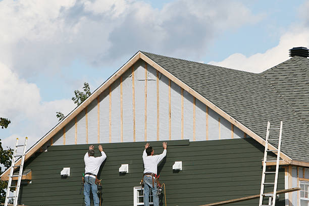 Professional Siding Contractor technician working in Pine Level, NC